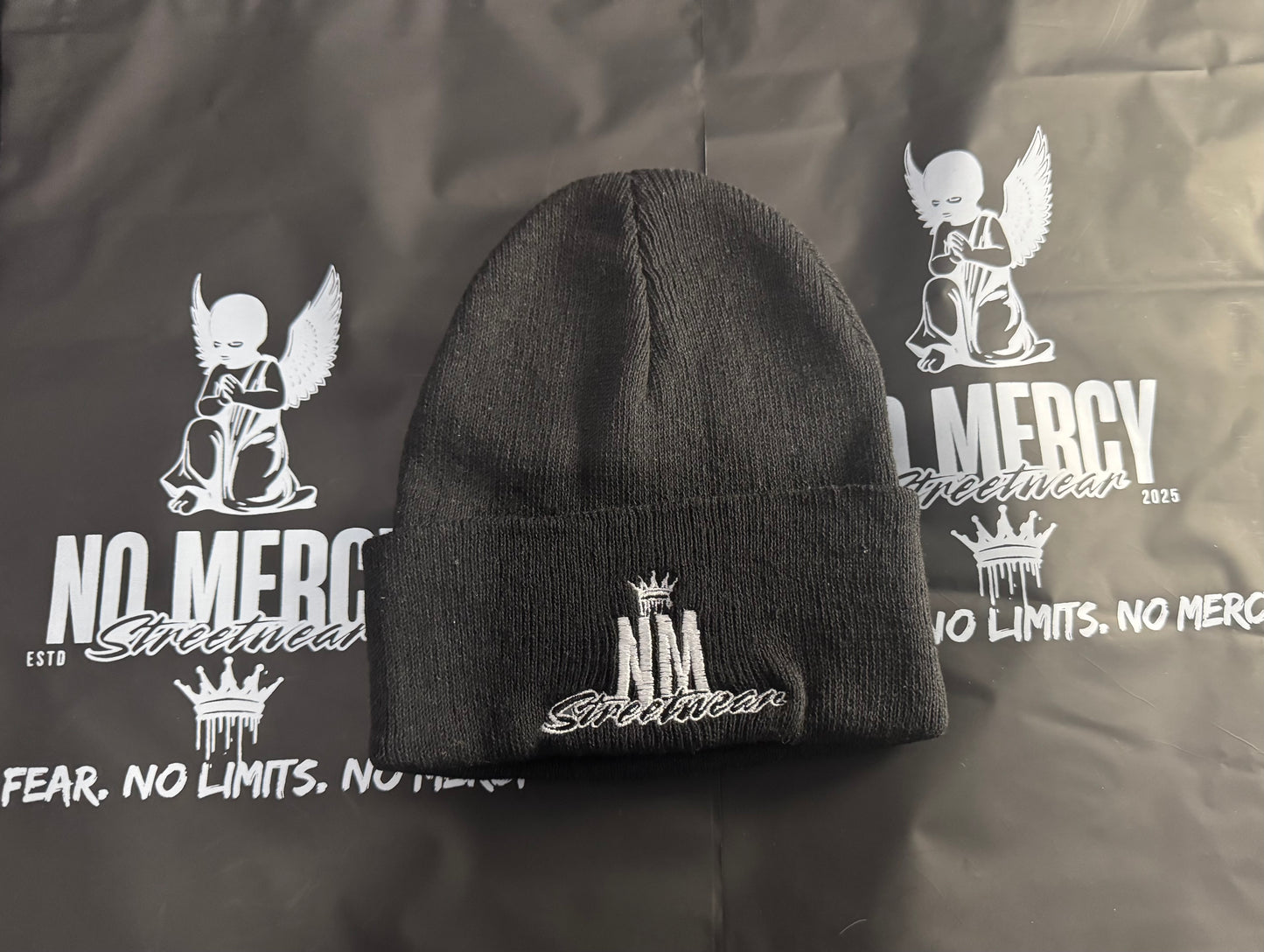 NM black beanie